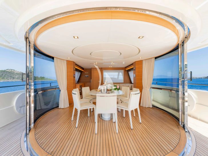 MILENA Custom Line Navetta 28 - sky deck dining area MILENA Custom Line Navetta 28 - sky deck dining area