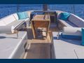 MINDFULNESS Advance Yacht A80 upper deck seating and dining area