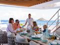 MINE GAMES Benetti B.Now 50 - guests having an alfresco breakfast MINE GAMES Benetti B.Now 50 - guests having an alfresco breakfast