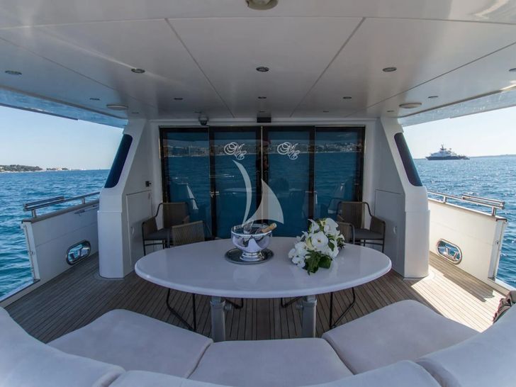 MISS CANDY Versilcraft 30m - aft deck dining area MISS CANDY Versilcraft 30m - aft deck dining area