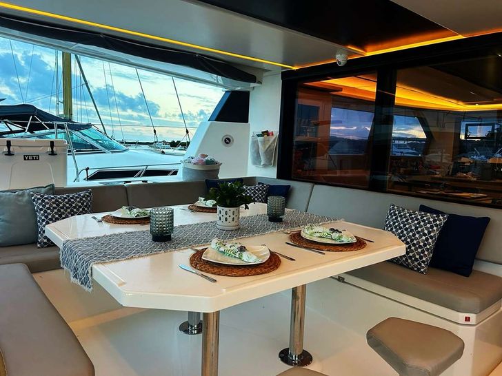 MOTHER OCEAN Leopard 50 - aft cockpit dining area MOTHER OCEAN Leopard 50 - aft cockpit dining area