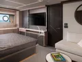MOWANA Sunseeker 95 - master cabin bed and TV MOWANA Sunseeker 95 - master cabin bed and TV