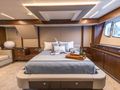 MOZZ II Sunseeker 88 Yacht master cabin with wine on the bed