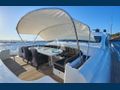 MRS GREY Mangusta 130 foredeck dining and lounging area