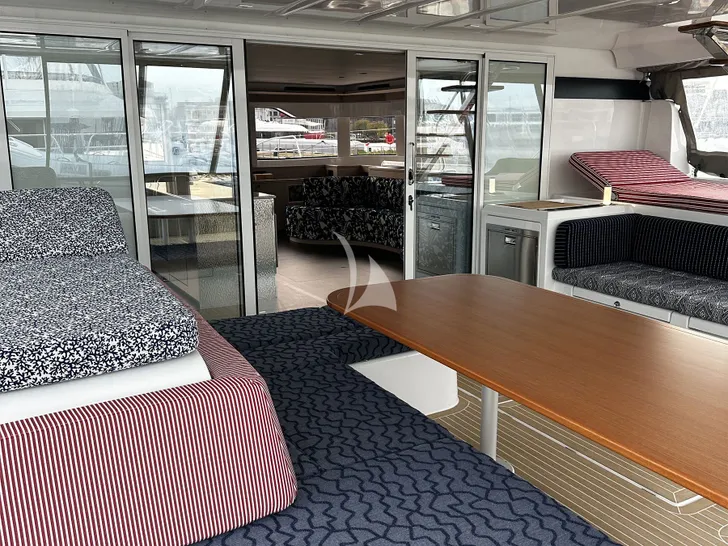 NAMA Lagoon 60 - aft deck lounge and alfresco dining area NAMA Lagoon 60 - aft deck lounge and alfresco dining area