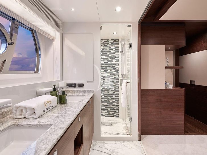 NAYA MARYN Horizon 94 - master cabin bathroom wide shot NAYA MARYN Horizon 94 - master cabin bathroom wide shot