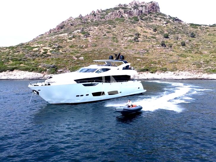 NEW EDGE Sunseeker 95 anchored with the tender