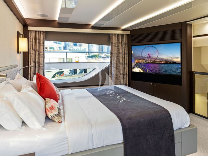 NEW EDGE Sunseeker 95 - master cabin bed and TV NEW EDGE Sunseeker 95 - master cabin bed and TV