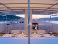 NIGHFLOWER Codecasa 35 - flybridge dining area NIGHFLOWER Codecasa 35 - flybridge dining area