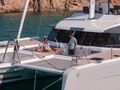 NIKA ONE Fountaine Pajot Samana 59 - guests on the foredeck lounge NIKA ONE Fountaine Pajot Samana 59 - guests on the foredeck lounge