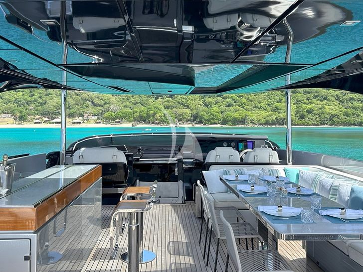 NOI Riva Argo 90 flybridge dining area and bar