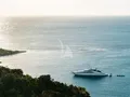 NORMA JEAN Palmer Johnson 150 - anchored near an island NORMA JEAN Palmer Johnson 150 - anchored near an island