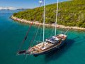 GULET NOSTRA VITA Custom 32m - anchored near an island GULET NOSTRA VITA Custom 32m - anchored near an island