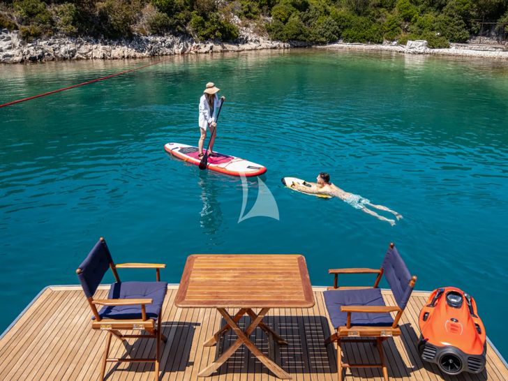 NO STRESS 888 Riva Corsaro 100 - swim platform and guests using water toys NO STRESS 888 Riva Corsaro 100 - swim platform and guests using water toys