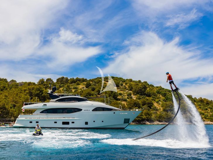 NOVELA Custom CBI Navi 30m - guests doing water sports NOVELA Custom CBI Navi 30m - guests doing water sports