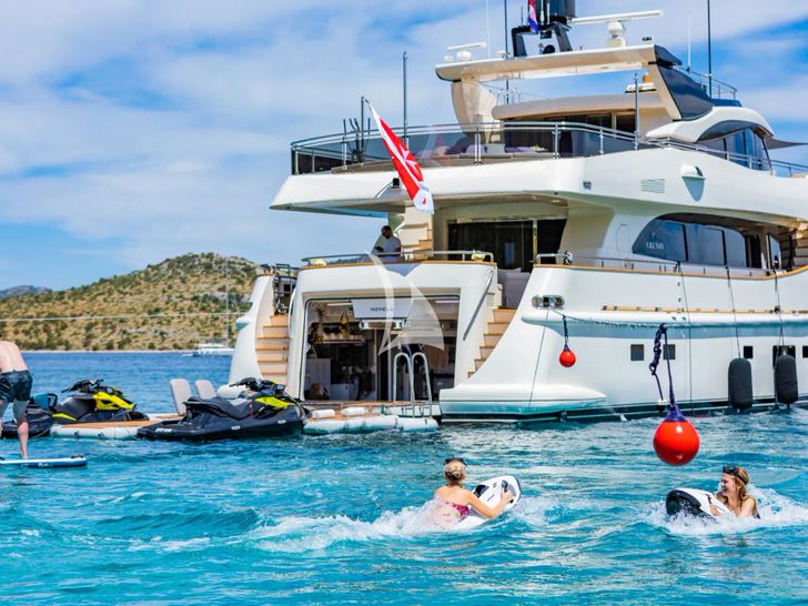 NOVELA Custom CBI Navi 30m - guests having fun with the water toys NOVELA Custom CBI Navi 30m - guests having fun with the water toys