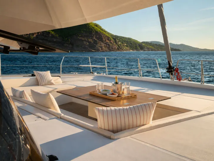 OCEANS ONE Bali 5.8 - foredeck lounge with dining area OCEANS ONE Bali 5.8 - foredeck lounge with dining area