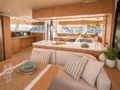 OCEANS ONE Bali 5.8 - salon dining and open galley OCEANS ONE Bali 5.8 - salon dining and open galley