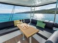 ONE FEELING Lagoon 51 - flybridge seating with table ONE FEELING Lagoon 51 - flybridge seating with table