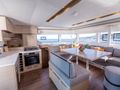 ONE FEELING Lagoon 51 - galley and indoor dining area ONE FEELING Lagoon 51 - galley and indoor dining area
