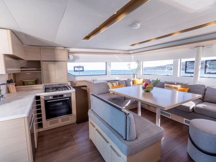 ONE FEELING Lagoon 51 - galley and indoor dining area ONE FEELING Lagoon 51 - galley and indoor dining area