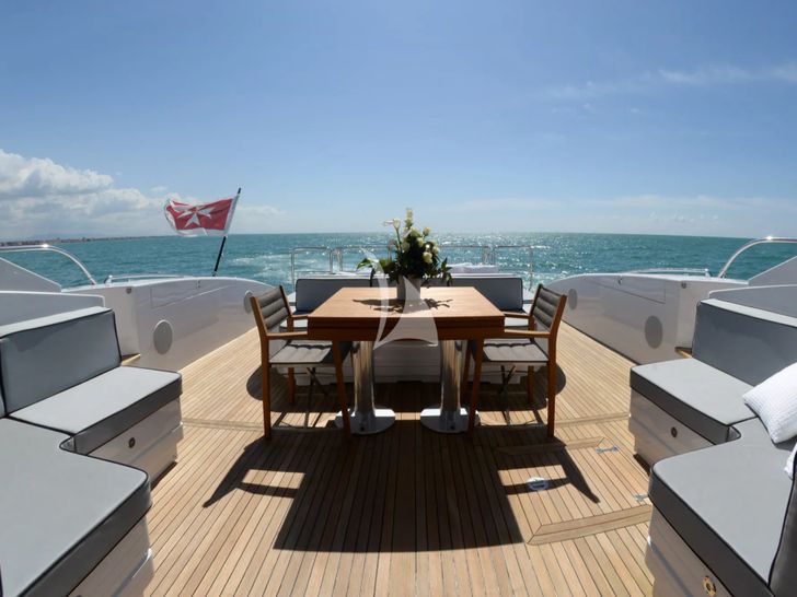 ONLY ONE Overmarine Mangusta 92 - aft deck alfresco dining ONLY ONE Overmarine Mangusta 92 - aft deck alfresco dining