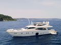 ORLANDO L Ferretti 780 - anchored with the tender ORLANDO L Ferretti 780 - anchored with the tender