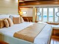 ORLANDO L Ferretti 780 - master cabin bed and seating area ORLANDO L Ferretti 780 - master cabin bed and seating area
