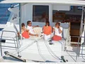 PALUKO LAGOON 421 - guests lounging around aft cockpit lounge PALUKO LAGOON 421 - guests lounging around aft cockpit lounge