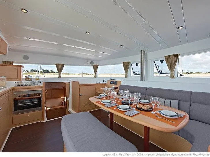 PALUKO Lagoon 421 - salon dining area and galley PALUKO Lagoon 421 - salon dining area and galley
