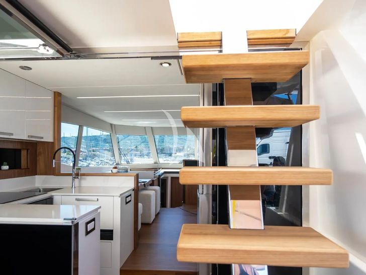PANTA REI Monachus 70 Fly - galley and staircase PANTA REI Monachus 70 Fly - galley and staircase