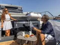 PEARLY SPENCER Pearl 82 - guests lounging on the foredeck PEARLY SPENCER Pearl 82 - guests lounging on the foredeck