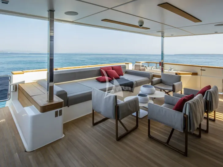 PLAN B Ferretti Custom Line Navetta 33 - main aft deck lounge and dining area PLAN B Ferretti Custom Line Navetta 33 - main aft deck lounge and dining area