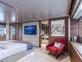 PLAN B Ferretti Custom Line Navetta 33 - master cabin bed and TV PLAN B Ferretti Custom Line Navetta 33 - master cabin bed and TV
