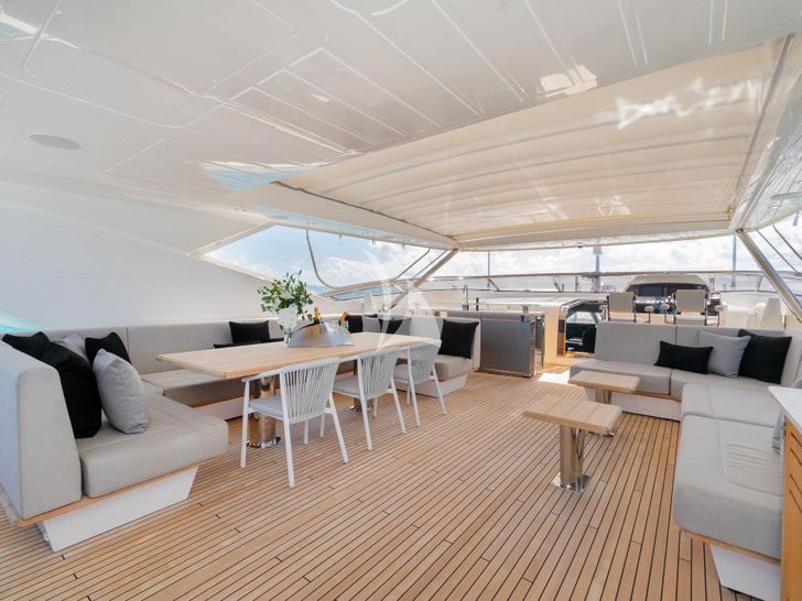 POPS Sunseeker 116 Sport flybridge seating and dining area