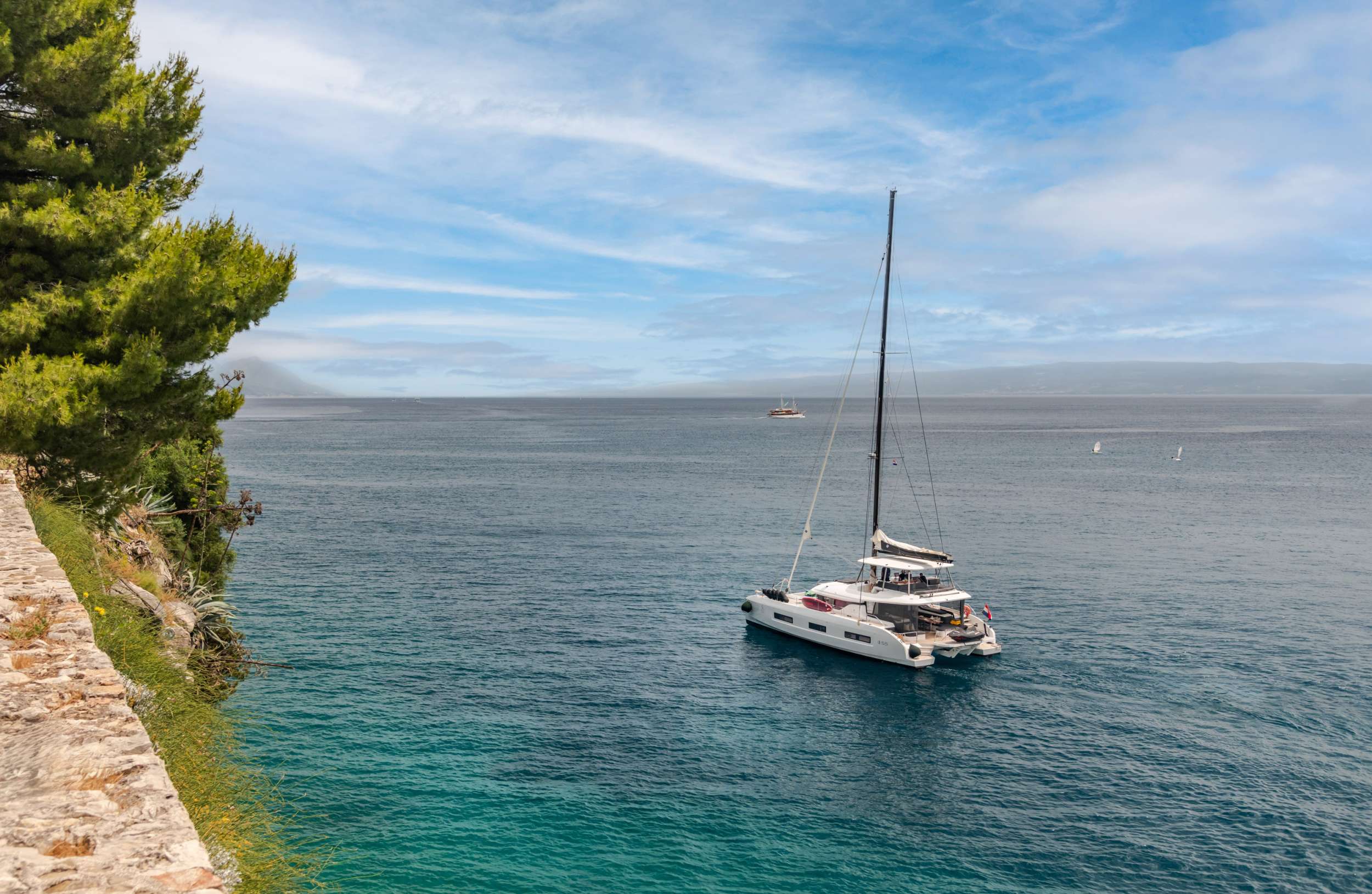 PRINCESS S Lagoon 55 - anchored near an island