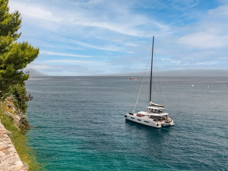 PRINCESS S Lagoon 55 - anchored near an island PRINCESS S Lagoon 55 - anchored near an island