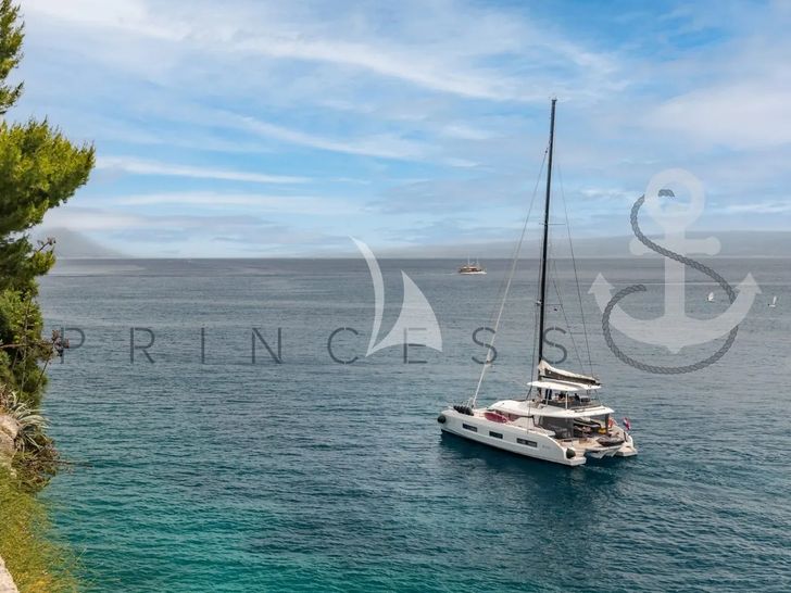 PRINCESS S Lagoon 55 - anchored near an island PRINCESS S Lagoon 55 - anchored near an island