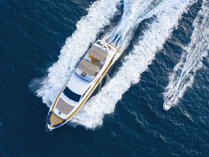 QUO VADIS I Ferretti 760 - aerial shot cruising with the tender QUO VADIS I Ferretti 760 - aerial shot cruising with the tender