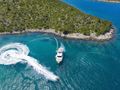 QUO VADIS I Ferretti 760 - anchored near an island QUO VADIS I Ferretti 760 - anchored near an island