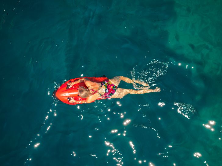 QUEEN ELEGANZA Custom Motor Yacht 49m - guest using the sea bob QUEEN ELEGANZA Custom Motor Yacht 49m - guest using the sea bob