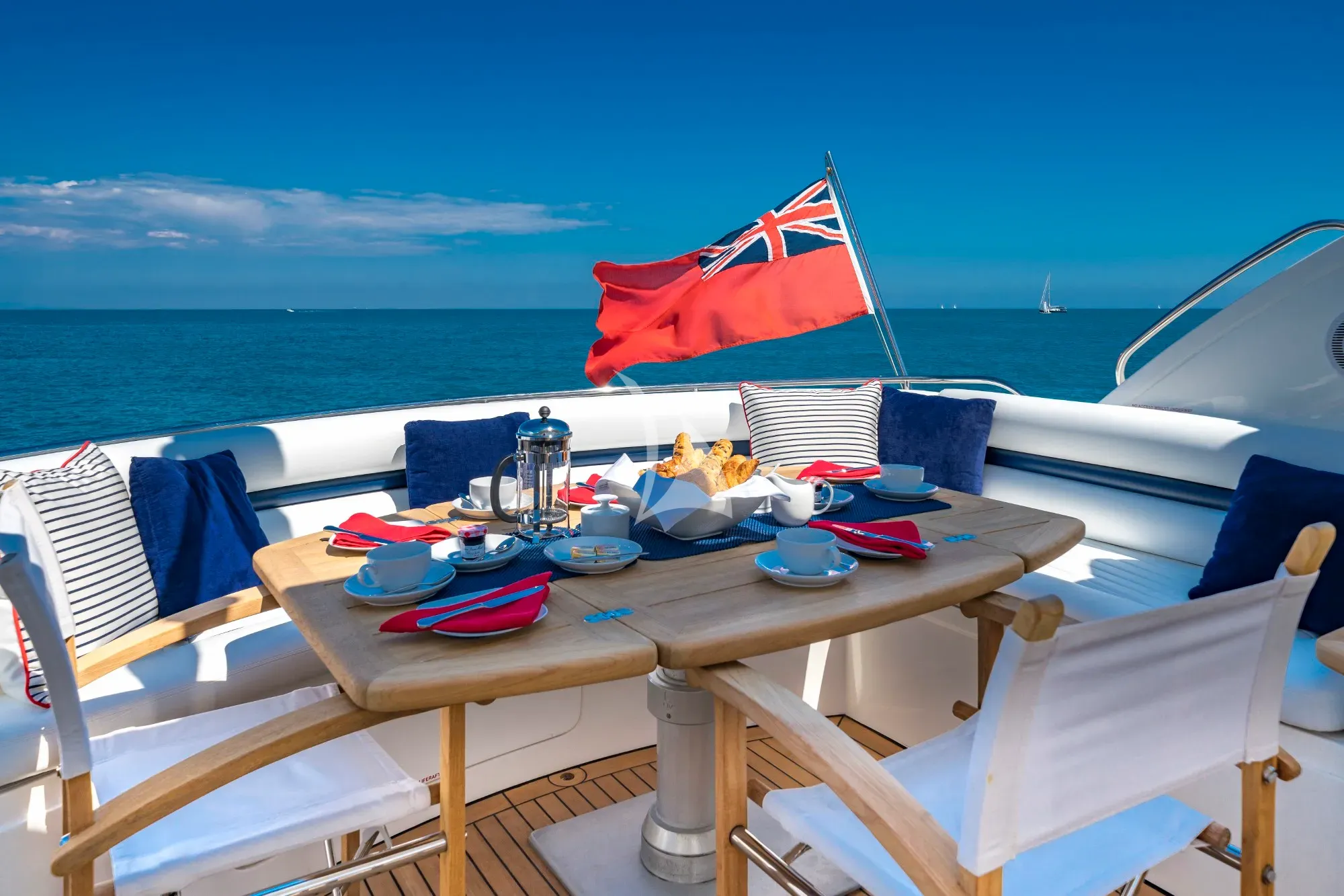 REHAB Sunseeker Predator 68 - alfresco dining set up
