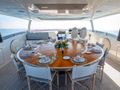 RESTLESS Princess 35m - flybridge dining area RESTLESS Princess 35m - flybridge dining area