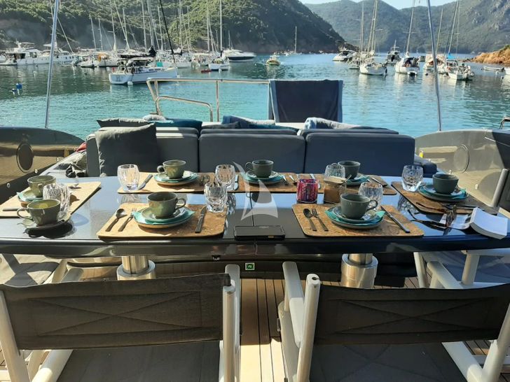 REVELLA Mangusta 92 - aft deck alfresco dining area REVELLA Mangusta 92 - aft deck alfresco dining area