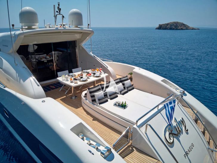 RUBY Tecnomar Velvet 83 - aft deck sun bed and dining area RUBY Tecnomar Velvet 83 - aft deck sun bed and dining area