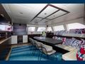 S/Y FENG Sunreef 70 saloon seating and dining with TV