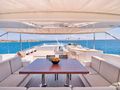 SANJANA Leight Notika Centaurian 108 - flybridge dining area SANJANA Leight Notika Centaurian 108 - flybridge dining area