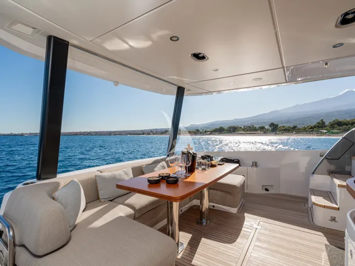 SBK Azimut 68 Fly - main aft deck alfresco dining area SBK Azimut 68 Fly - main aft deck alfresco dining area