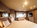 SEA SONS Ferretti 700 master cabin bed and seating area