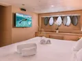 SEAS THE DAY Posillipo Technema 85 - master cabin bed and TV SEAS THE DAY Posillipo Technema 85 - master cabin bed and TV